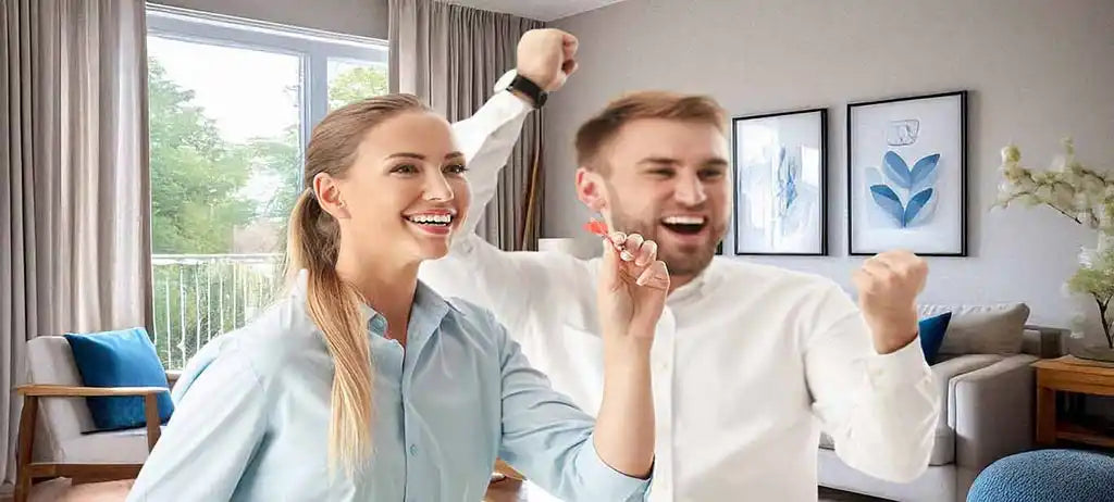 Excited couple holding keys.